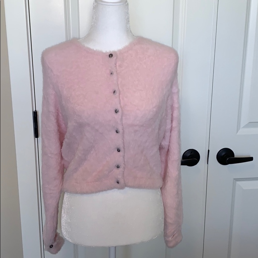 Free People pink fuzzy sweater.